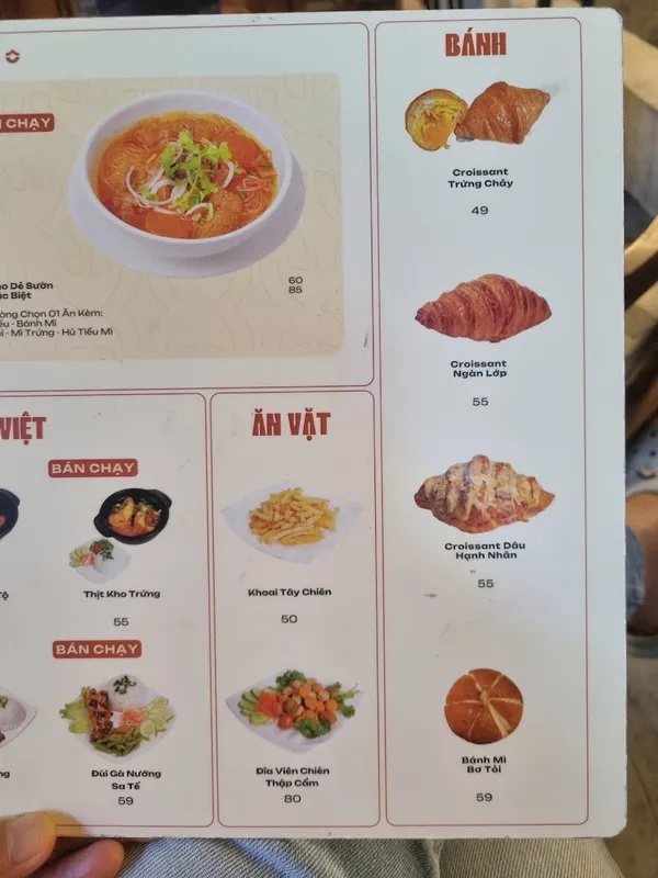 Trang thực đơn với các món bánh, món ăn vặt và giá bán.